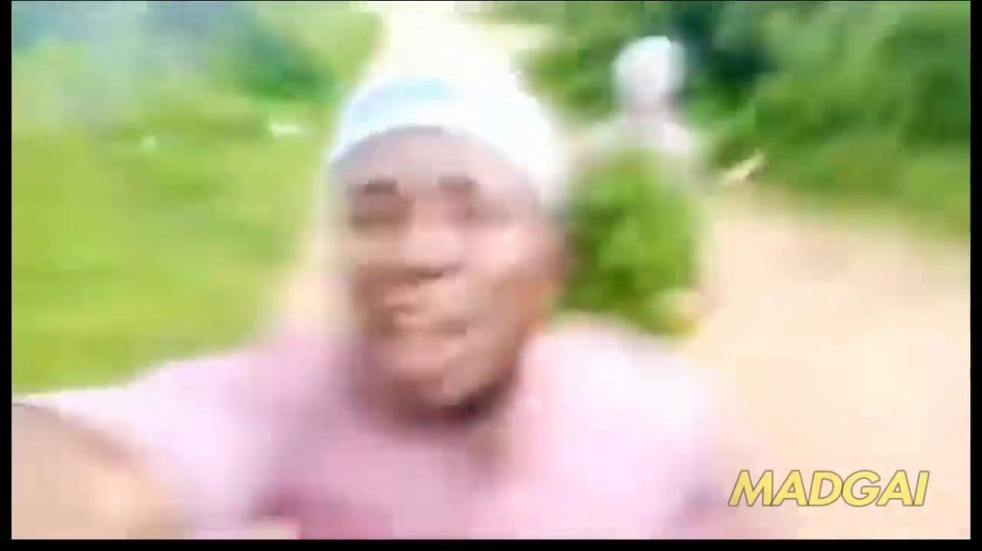 ⁣african guy running away from tribe member but with sponge bob music